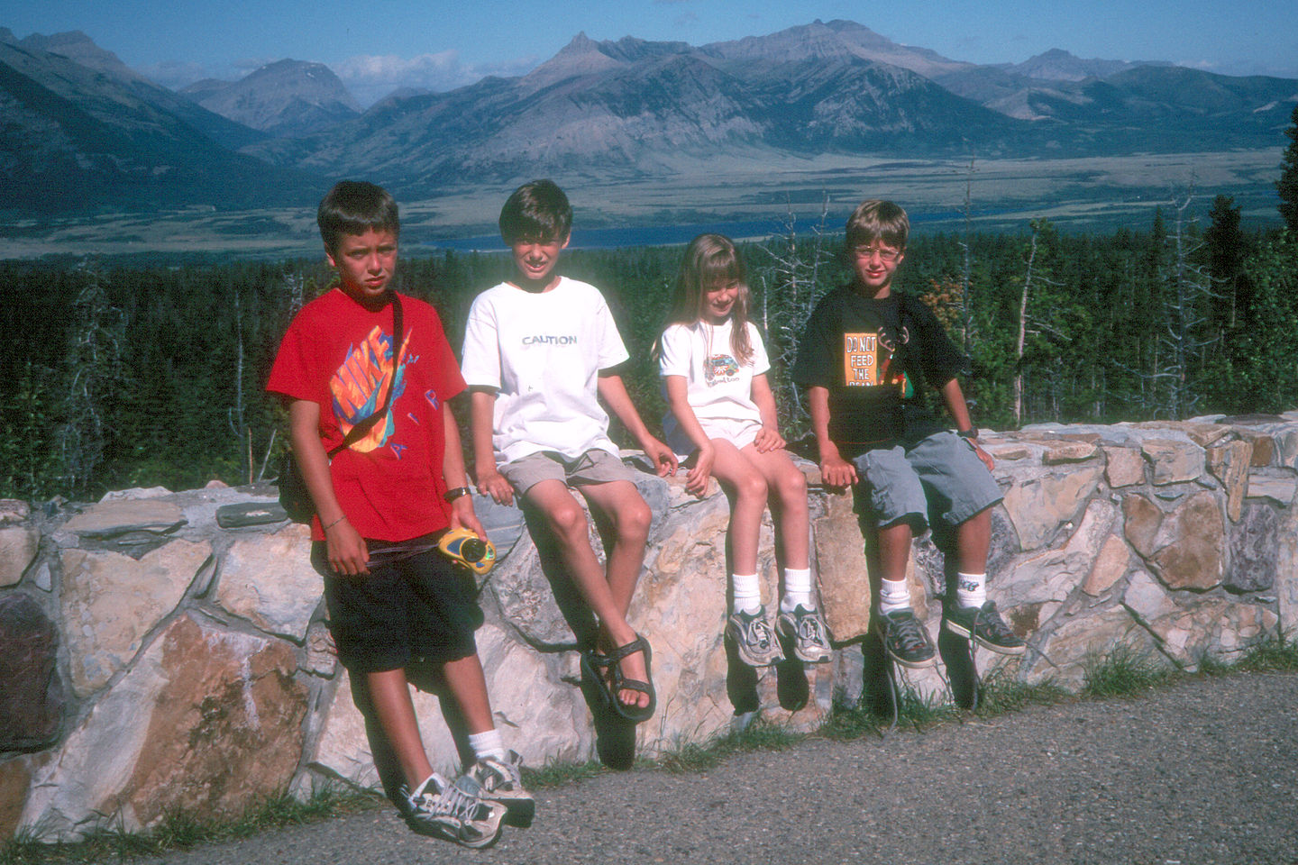 Kids on drive between Glacier and Waterton