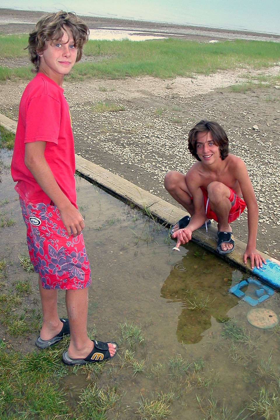 Boys with their tiny catch