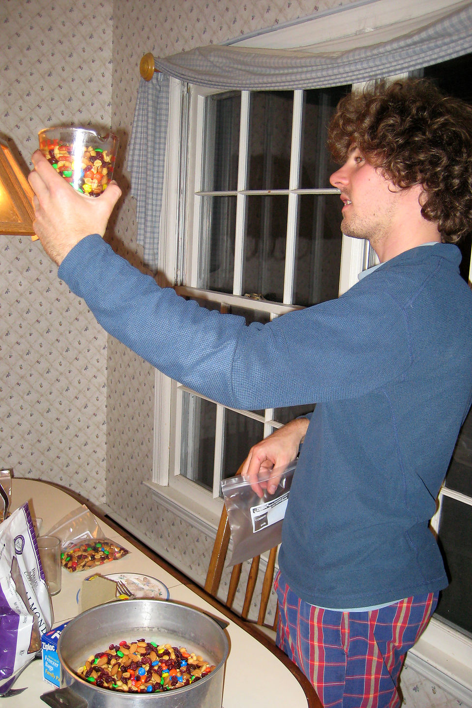 Nik measuring out bags of homemade gorp