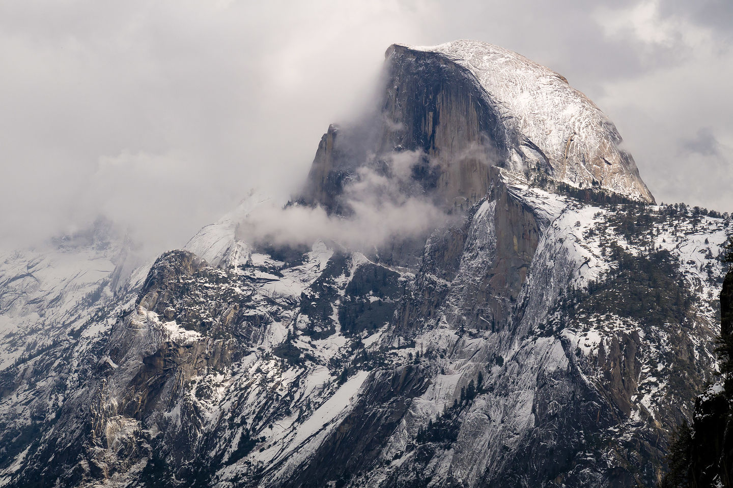 It's snowing on Half Dome!!