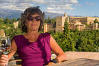 Lolo enjoying her wine from atop the Albaicin