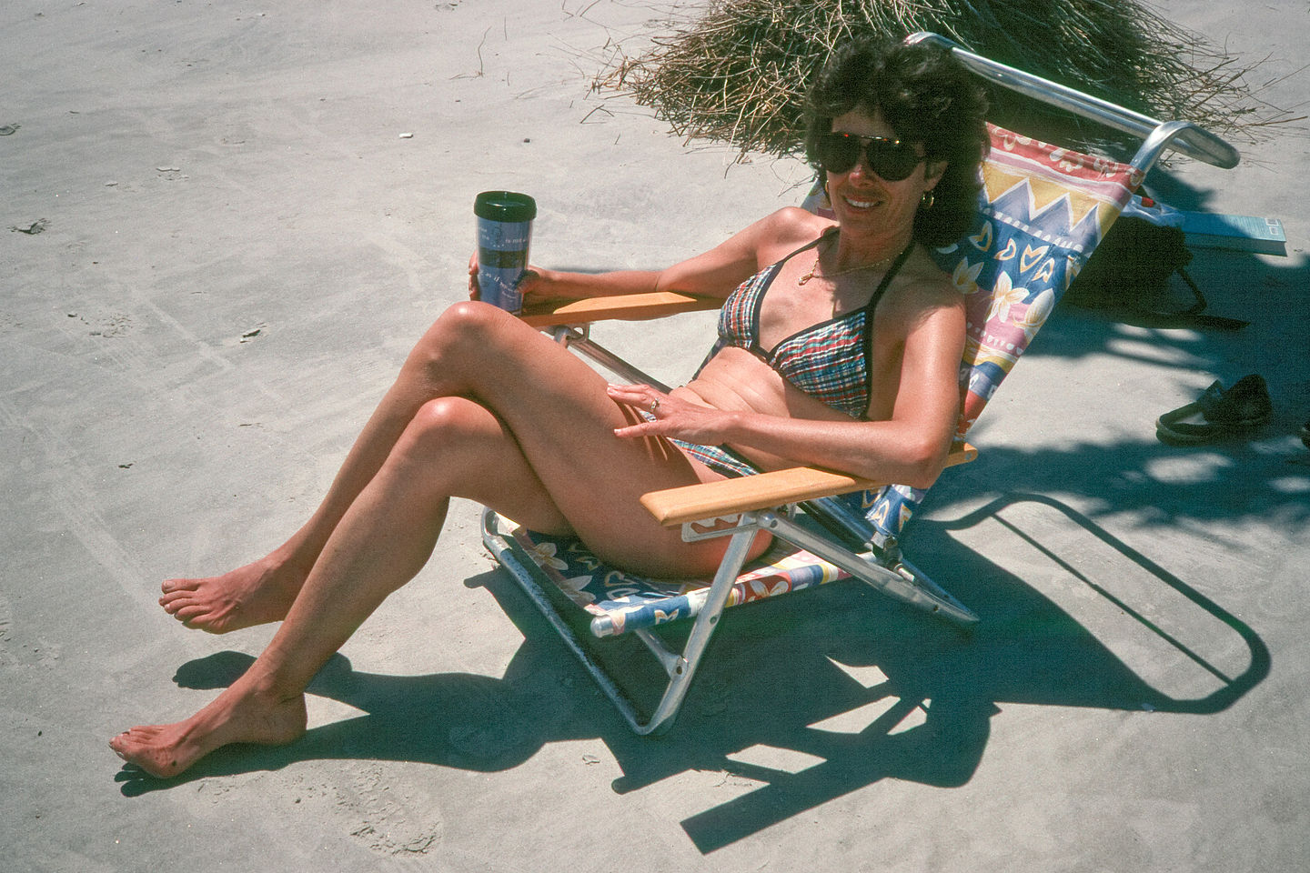 Lolo sun bathing on beach